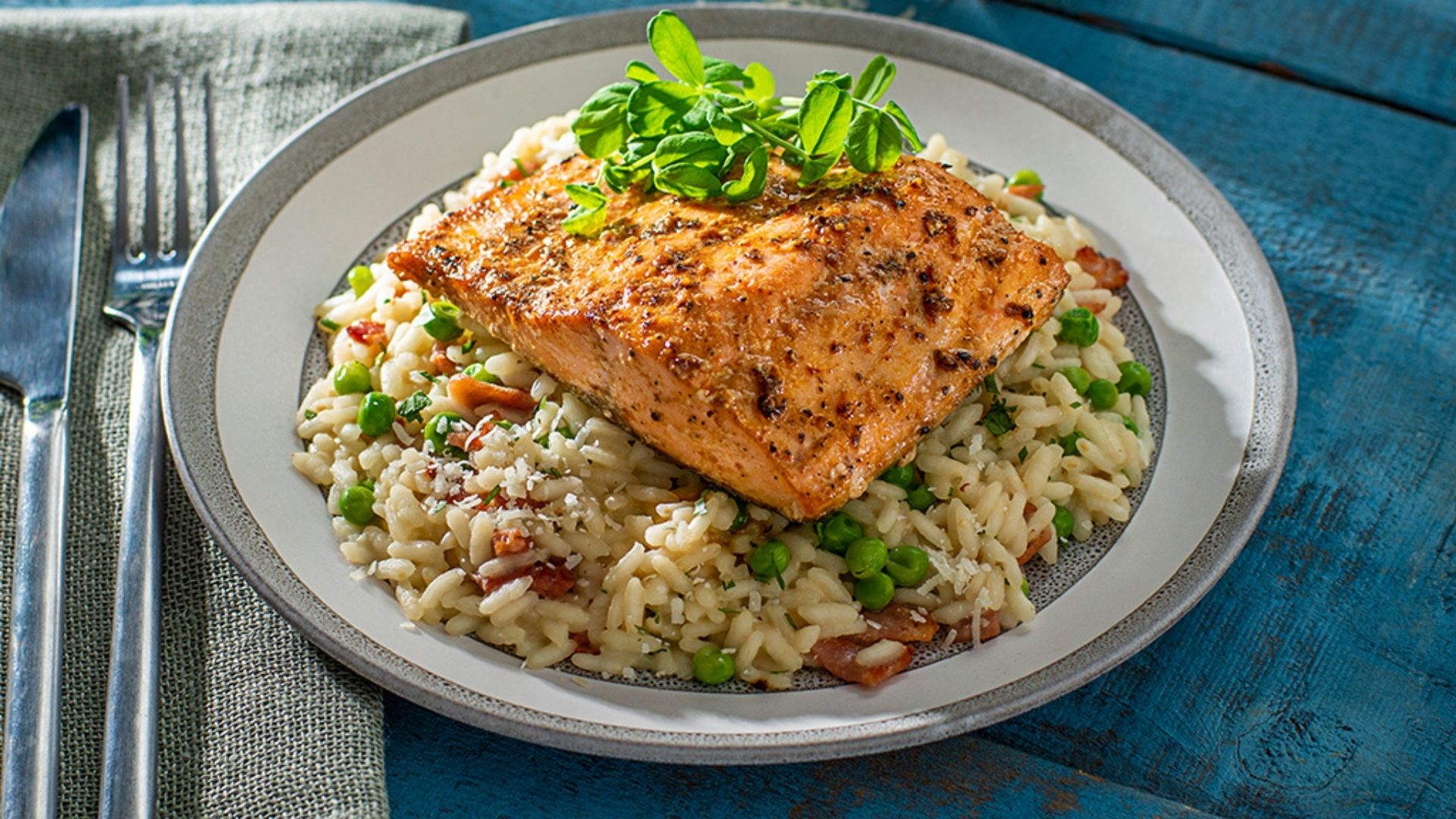 Butter Poached Pepper Crusted King Salmon Over Bacon & Vegetable Risotto
